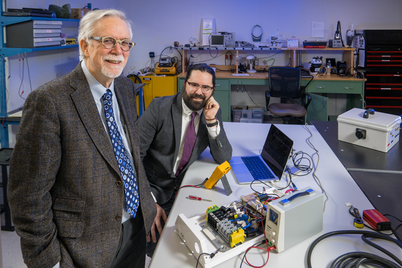 University of Delaware researchers Willett Kempton (left) and Rodney McGee collaborate on electric vehicle research at the Center for Transportation Electrification on UD’s Science, Technology and Advanced Research (STAR) Campus. 