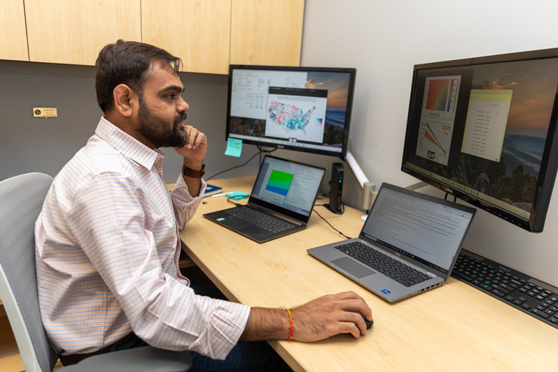 Tarang Parekh works on a computer