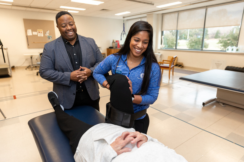 Hicks, a research champion aiming to improve the health of older adults, is shown monitoring treatment with physical therapist Natasha Lobo at the Physical Therapy Clinic on UD’s Science, Technology and Advanced Research (STAR) Campus.