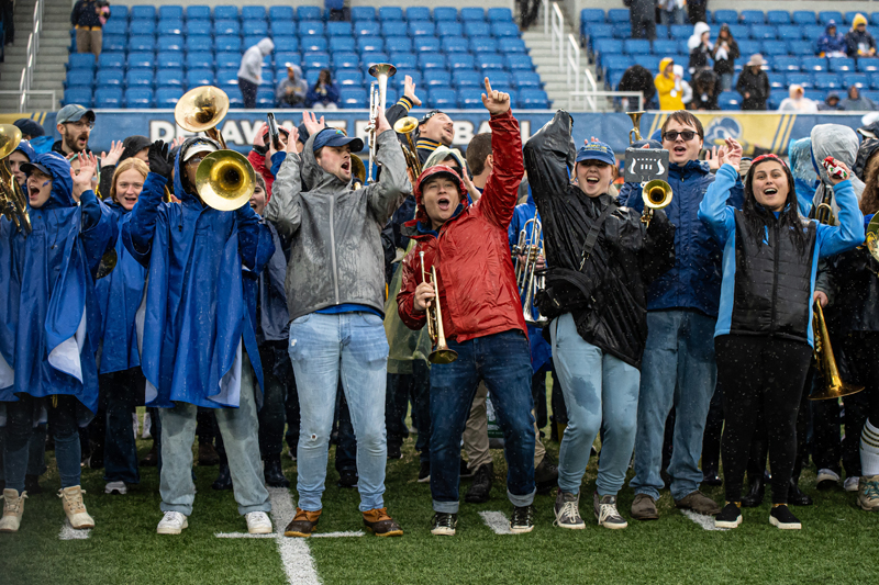 More than 300 UDMB alumni joined current band members on the field during the Oct. 14 Homecoming game. More than 300 UDMB alumni joined current band members on the field during the Oct. 14 Homecoming game.