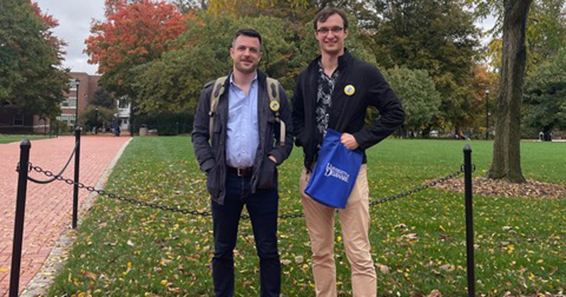 Alumni Paul King and Neil Redfield return to campus to organize a college tour for New York City high school students. Alumni Paul King and Neil Redfield return to campus to organize a college tour for New York City high school students.