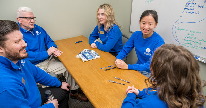 Center for Health Profession Studies staff meet with students