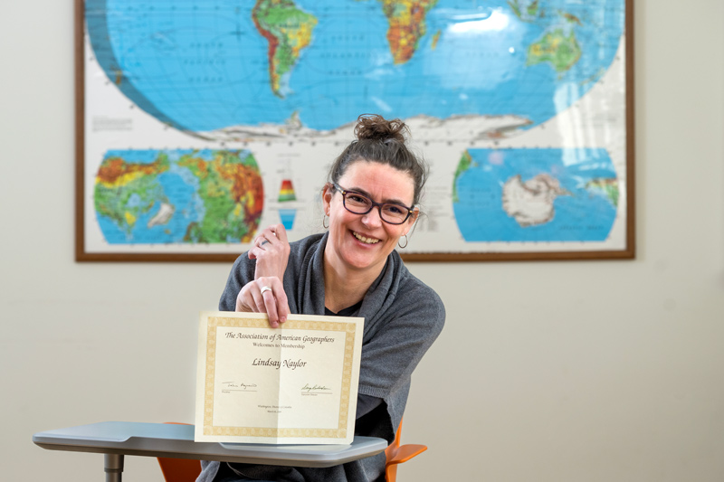 Lindsay Naylor, associate professor in the UD Department of Geography and Spatial Sciences, has been recognized by the American Association of Geographers (AAG) for her significant contributions to advancing geography by being named an AAG Fellow. Being named an AAG Fellow is a recognition for geographers who have made significant contributions to advancing geography and is conferred for life. Naylor said that the award is a huge honor and that it feels rewarding to be named a fellow to an organization that she has been active in since her days as a graduate student. 