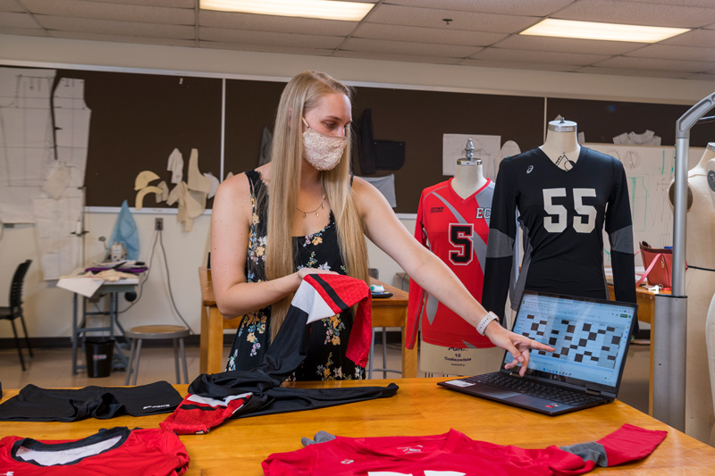 Undergraduate research is a vibrant part of the student experience at the University of Delaware. Jenna Tomasch, a junior at the University of Delaware majoring in fashion design and product innovation, has been studying ways to improve athletic wear for women’s team sports. She did research as a Summer Scholar in 2022, when this photo was taken, and is among those who will participate in UD’s first Winter Showcase of Undergraduate Research, Scholarly and Creative Works on Feb. 15.