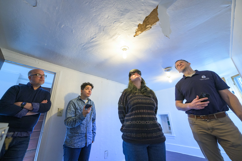 Examining some damage to an upstairs ceiling in the museum are (from left) Ryan Grover, Margalit Schindler, Morrigan Kelley and Tim Leefeldt. Examining some damage to an upstairs ceiling in the museum are (from left) Ryan Grover, Margalit Schindler, Morrigan Kelley and Tim Leefeldt.