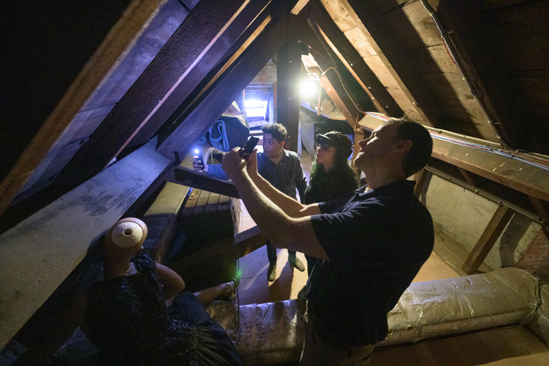 In the museum’s attic, team members (from left) Margalit Schindler, Morrigan Kelley and Tim Leefeldt check out the condition of some wooden beams. In the museum’s attic, team members (from left) Margalit Schindler, Morrigan Kelley and Tim Leefeldt check out the condition of some wooden beams.