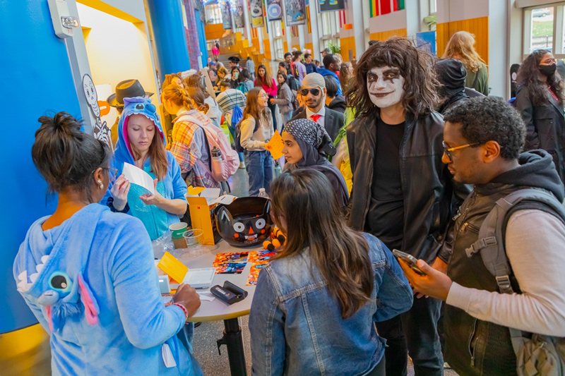 World Scholars and Student Wellbeing Ambassadors shared Halloween traditions with international students at a themed International Coffee Hour in October. World Scholar Bella Pykosh, a junior studying Communications, enjoyed sharing traditions from one of her favorite holidays with classmates who may be enjoying Halloween for the first time. World Scholars and Student Wellbeing Ambassadors shared Halloween traditions with international students at a themed International Coffee Hour in October. World Scholar Bella Pykosh, a junior studying Communications, enjoyed sharing traditions from one of her favorite holidays with classmates who may be enjoying Halloween for the first time.