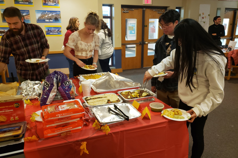 Students from around the world gathered at the iHouse Living-Learning Community on Ray Street to celebrate Friendsgiving with a potluck dinner.
