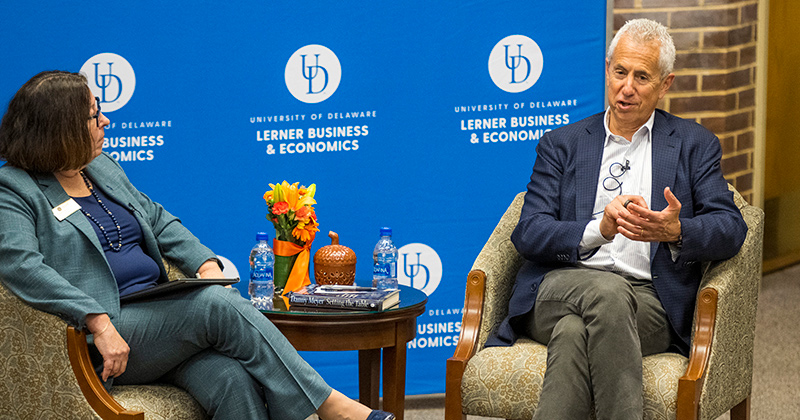 Danny Meyer (right) and UD Prof. Sheryl Kline discuss Meyer’s book “Setting the Table” and the power of hospitality during the Paul Wise Speaker Series.