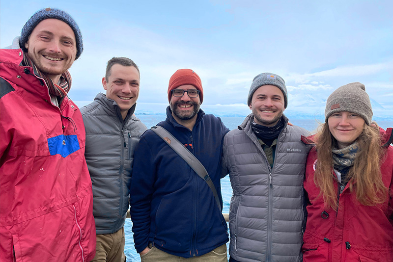UD coastal physical oceanographer Carlos Moffat (center) is working to understand the dynamics of melting glaciers and how that impacts the water circulation patterns and properties, such as salinity and temperature of the coastal oceans of Antarctica. UD students participating in the work from the Moffat lab include (from left to right) recent undergraduate student Michael Cappola, masters students Evan Quinter and Jake Gessay, and doctoral student and Unidel fellow Frederike (Rikki) Benz. UD coastal physical oceanographer Carlos Moffat (center) is working to understand the dynamics of melting glaciers and how that impacts the water circulation patterns and properties, such as salinity and temperature of the coastal oceans of Antarctica. UD students participating in the work from the Moffat lab include (from left to right) recent undergraduate student Michael Cappola, masters students Evan Quinter and Jake Gessay, and doctoral student and Unidel fellow Frederike (Rikki) Benz.