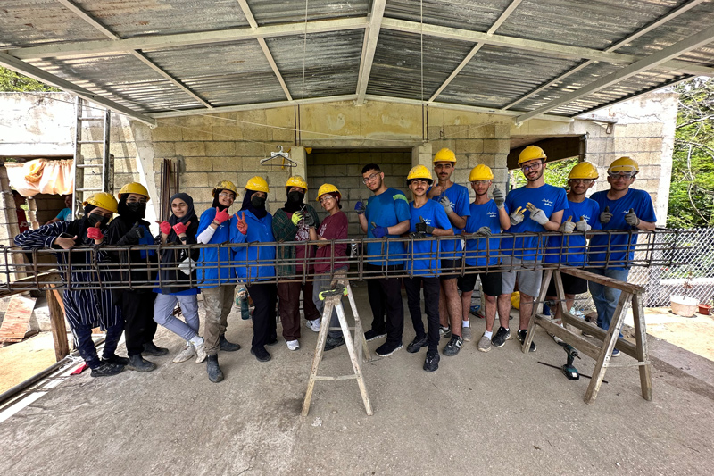Students worked with community members to build hurricane-resistant homes in the small community of Villa del Rio, Puerto Rico. Students worked with community members to build hurricane-resistant homes in the small community of Villa del Rio, Puerto Rico.