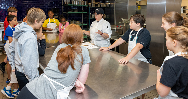 Children entering fifth through ninth grades learned about cooking from the experts in the University of Delaware’s restaurant, Vita Nova. Children entering fifth through ninth grades learned about cooking from the experts in the University of Delaware’s restaurant, Vita Nova.