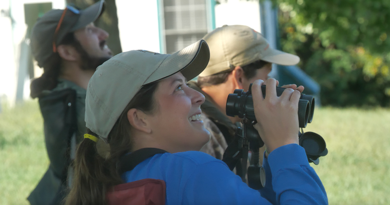Leah Rudge and the hawk migration team observe the wildlife at Harpers Ferry National Historical Park. 