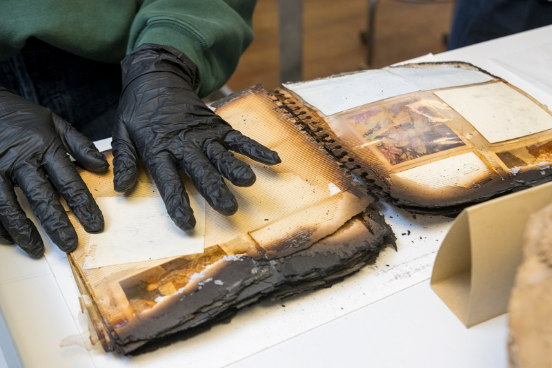 Students in the internationally recognized Winterthur/University of Delaware Program in Art Conservation have helped an Ohio family repair and clean photographs damaged during a deadly fire in 2021. Students in the internationally recognized Winterthur/University of Delaware Program in Art Conservation have helped an Ohio family repair and clean photographs damaged during a deadly fire in 2021.