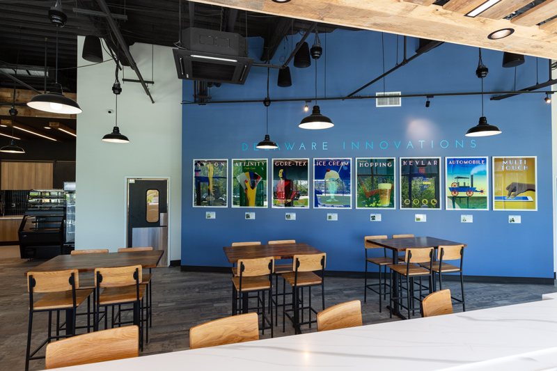 The first thing customers see when they walk into the new Grain restaurant at UD’s STAR Campus is a panel of artwork depicting Delaware innovations. The first thing customers see when they walk into the new Grain restaurant at UD’s STAR Campus is a panel of artwork depicting Delaware innovations.