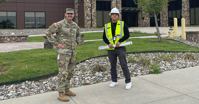 Frederick Sanchez (right) with Second Lieutenant Michael C. Schiavone, the DEARNG Construction and Facilities Management Office’s Project Coordination Specialist. Frederick Sanchez (right) with Second Lieutenant Michael C. Schiavone, the DEARNG Construction and Facilities Management Office’s Project Coordination Specialist.