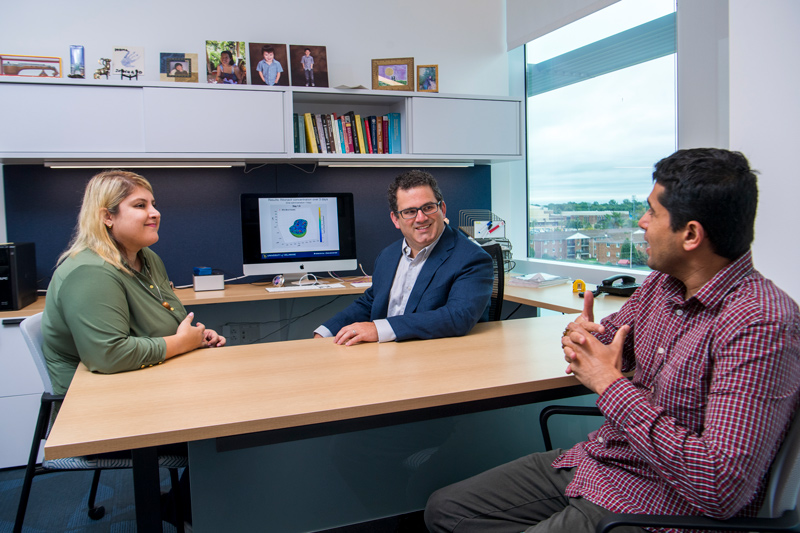 From left to right, Yasmin Moghadamnia, UD doctoral student, meets with her adviser and CBB Executive Committee member Ryan Zurakowski and with Abhyudai Singh, co-director of the new predoctoral training program in data science. Thirty faculty from UD and Delaware State University are affiliated with the program. From left to right, Yasmin Moghadamnia, UD doctoral student, meets with her adviser and CBB Executive Committee member Ryan Zurakowski and with Abhyudai Singh, co-director of the new predoctoral training program in data science. Thirty faculty from UD and Delaware State University are affiliated with the program.