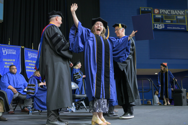The 2023 University of Delaware Doctoral Hooding Ceremony was held on May 25 at the Bob Carpenter Center and event is a joyous milestone for students who have spent years working toward their goal. The 2023 University of Delaware Doctoral Hooding Ceremony was held on May 25 at the Bob Carpenter Center and event is a joyous milestone for students who have spent years working toward their goal.