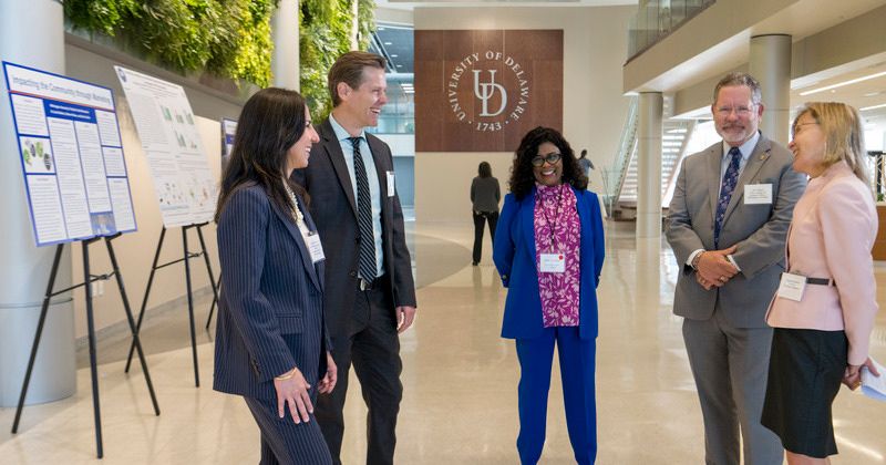 Representatives from five Delaware higher education institutions met at the fourth Annual Provost’s Symposium on Engaged Scholarship. Standing from left to right are Justina M. Thomas, vice president of academic affairs at Delaware Technical Community College; Joel D. Worden, associate provost/assistant vice president of academic affairs at Goldey-Beacom; Emily Allen Williams, vice provost at Delaware State University; Jim Wilson, vice president for academic affairs at Wilmington University, and Laura Carlson, provost of the University of Delaware.