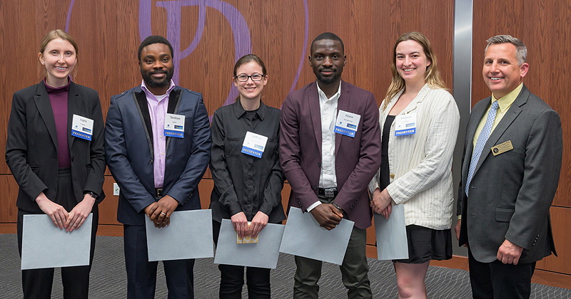 Student presenters (from left) Ingrid Havron, Temitope Idowu, Melinda Kleczynski, Abass Muhammed and Rebecca Lo Presti join Lou Rossi, dean of UD’s Graduate College and vice provost of graduate and professional education following the Spring 2023 Spark! Symposium.