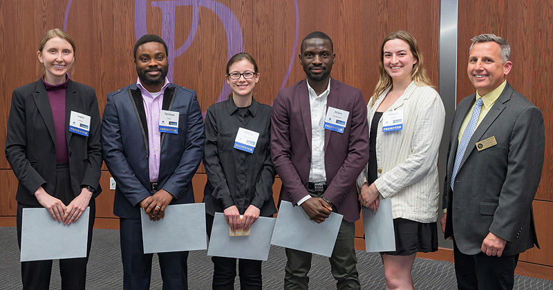 Student presenters (from left) Ingrid Havron, Temitope Idowu, Melinda Kleczynski, Abass Muhammed and Rebecca Lo Presti join Lou Rossi, dean of UD’s Graduate College and vice provost of graduate and professional education following the Spring 2023 Spark! Symposium. Student presenters (from left) Ingrid Havron, Temitope Idowu, Melinda Kleczynski, Abass Muhammed and Rebecca Lo Presti join Lou Rossi, dean of UD’s Graduate College and vice provost of graduate and professional education following the Spring 2023 Spark! Symposium.