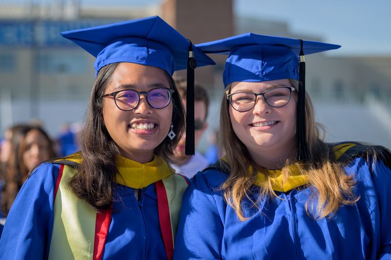 Rajani Shrestha (left) and Melinda Bahruth are looking forward to using their degrees to make an impact in the world.