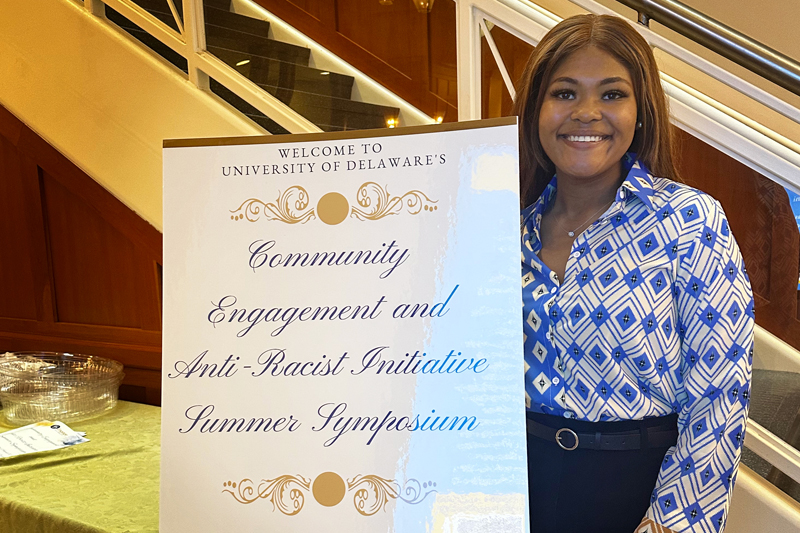 Chelsia Douglas, a doctoral student in UD’s Biden School, presents her project at the Community Engagement and Anti-Racism Initiative Summer Symposium.