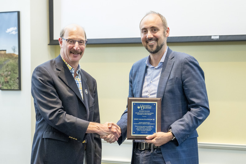 Michael Chajes (left), dean of the Honors College, presented alumnus Jimmy Sarakatsannis with the Chajes Family Distinguished Honors Alumni Award Michael Chajes (left), dean of the Honors College, presented alumnus Jimmy Sarakatsannis with the Chajes Family Distinguished Honors Alumni Award