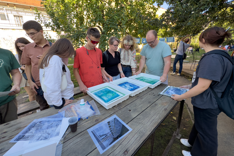 Workshops participants display their images at a pop-up exhibit.