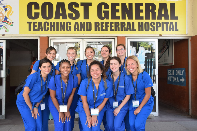 Nutrition and dietetics senior Katie Hamelin (first row, second from right) poses with a cohort of interns in front of Coast General Teaching Hospital. Nutrition and dietetics senior Katie Hamelin (first row, second from right) poses with a cohort of interns in front of Coast General Teaching Hospital.