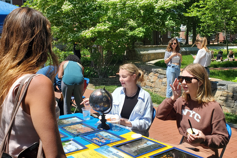 The Center for Global Programs and Services (CGPS) showcased the winning photos from the 2023 study abroad storytelling contest at the annual Global Festival in the spring. Students, faculty, alumni and friends gathered in Alumni Circle to admire the shots taken throughout the past century of study abroad.