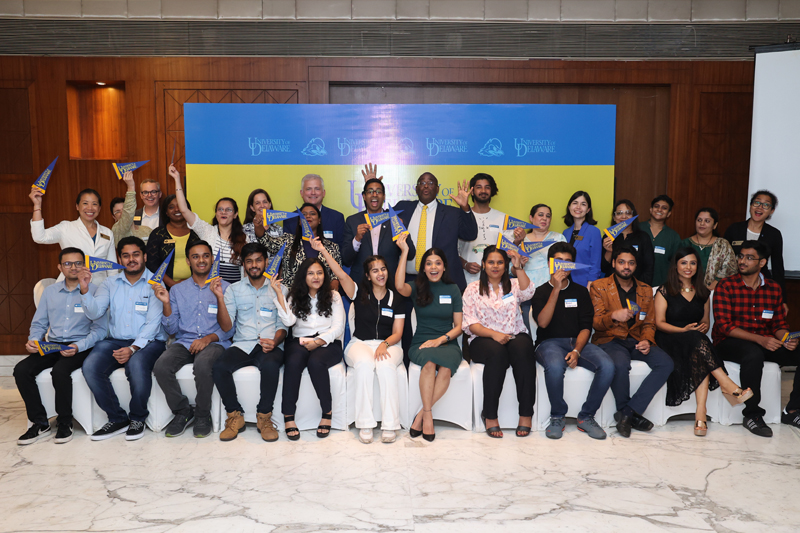 A cohort of incoming Indian students show off their Blue Hen pride. A cohort of incoming Indian students show off their Blue Hen pride.