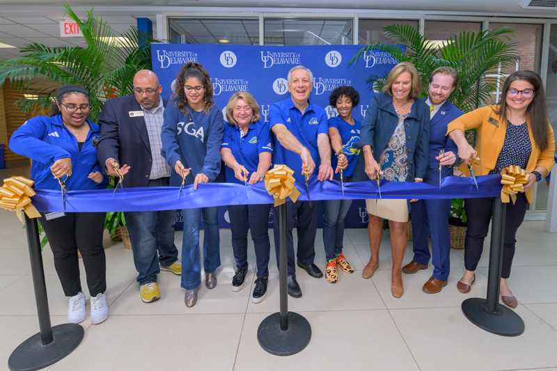 Members of the UD community cut the ribbon for the dedication of the Center for Intercultural Engagement in Perkins Student Center.