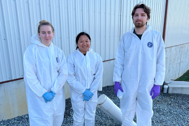University of Delaware student Olivia Frego (center) and fellow researchers Ashley Streithorst (left) and Tyler McKenna-Hansen (right) conduct weekly sampling and testing of SWECO vibratory screens at Kilby Dairy Farm in Rising Sun, Maryland.