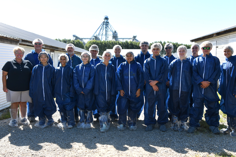 Georgie Cartanza (left) welcomes agriculture students to her farm in fall 2022.