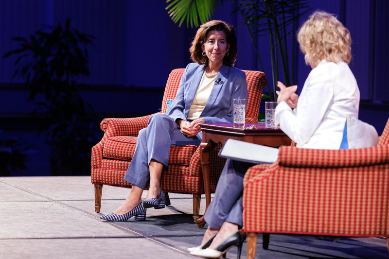 U.S. Commerce Secretary Gina Raimondo speaks onstage with Biden Institute Chair Valerie Biden Owens