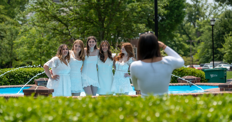 Posing for a picture by the UD fountain on The Green is part of the UD Bucket List.