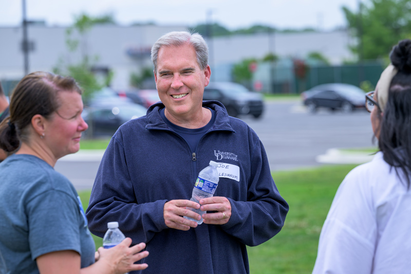 UD athletic training alumnus Joe Sczerba, who has been the athletic trainer at Salesianum School for nearly three decades, debriefs with colleagues after taking part in a day-long athletic training professional workshop at Newark Charter Junior High School, co-hosted by UD and the Delaware Athletic Trainers Association.