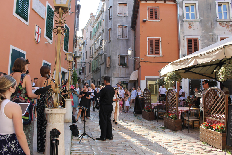 The Delaware Choral Scholars perform in an evening pop-up street concert in Rovinj, Croatia.