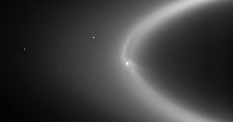 2023 Vernon Lecture photos - 1 A moon of Saturn in the black night sky.