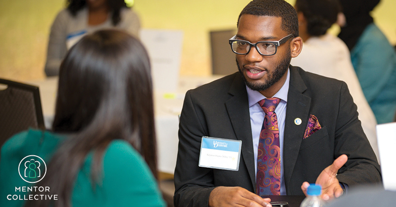Student talking with another individual about career opportunities.