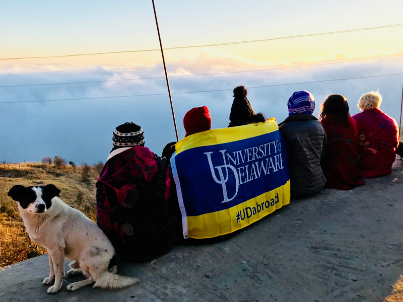 Barua and her students trek the Himalayas and admire the view from above the clouds.