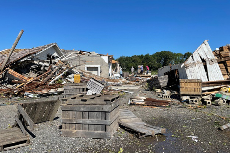 The buildings of Grasso and Son Farm were reduced to rubble by the tornado. The buildings of Grasso and Son Farm were reduced to rubble by the tornado.