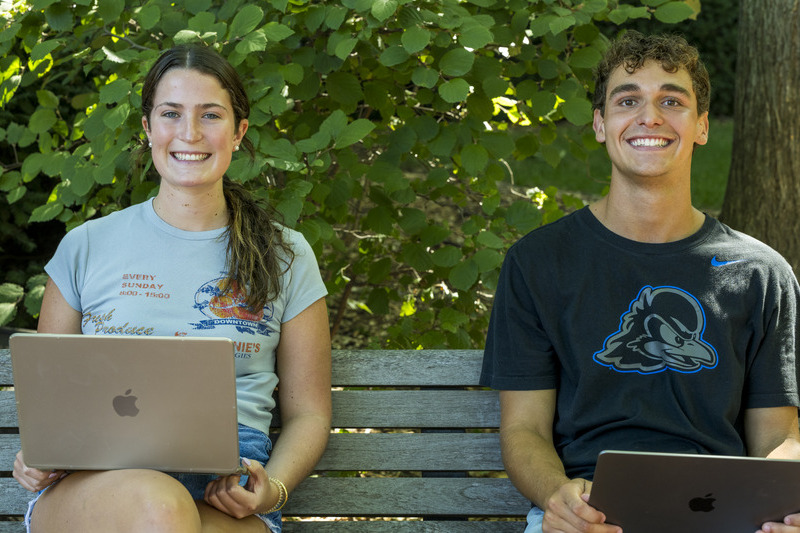 Students Ellie Finn and Daniel Shives strike up a conversation between classes. 