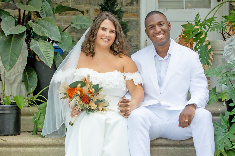Joshua and Megan Clarke on their wedding day at Joshua’s family home in Philadelphia.