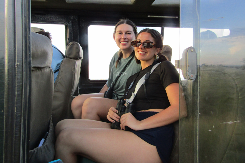 Chloe Schaffel and Alex Cassu, both senior wildlife ecology and conservation majors, await a Tanzanian safari.