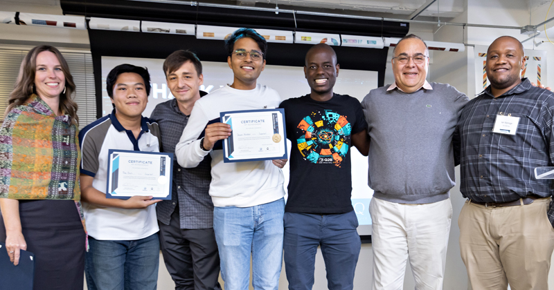 Bao Bach and members of his team celebrate their victory in the Big Q Quantum hackathon, which challenged students from around the world to solve a super-sized quantum computing problem.