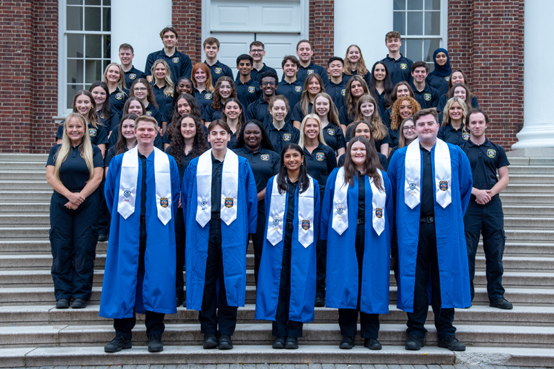 Each year, UDPD honors students from its UDECU and Cadet programs for their service and commitments to the community. In a May 17 special ceremony, the students received stoles to be worn, along with their caps and gowns, as they walked at Delaware Stadium on Saturday, May 25, with fellow Blue Hens in the Class of 2024. Each year, UDPD honors students from its UDECU and Cadet programs for their service and commitments to the community. In a May 17 special ceremony, the students received stoles to be worn, along with their caps and gowns, as they walked at Delaware Stadium on Saturday, May 25, with fellow Blue Hens in the Class of 2024.