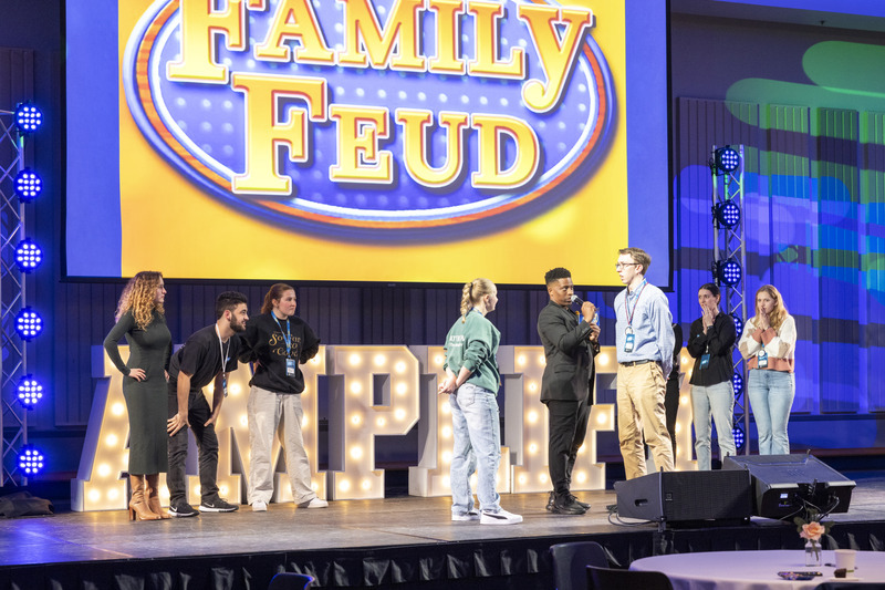 Host and hype man Blake Saunders led two student groups in a rousing version of Family Feud for prizes. Host and hype man Blake Saunders led two student groups in a rousing version of Family Feud for prizes.