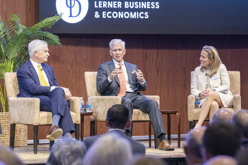Michael Farr, center, speaks as Patrick T. Harker, left, and Hilary Provinse, right, listen during a panel discussion at the 2024 Lyons CEEE Economic Forecast. 